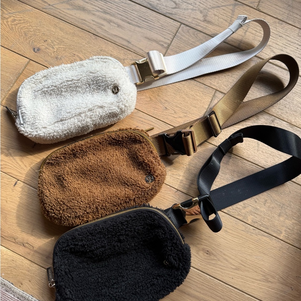 Lululemon fuzzy Fleece Belt Bags in Cream, Brown, and Black. Set of 3